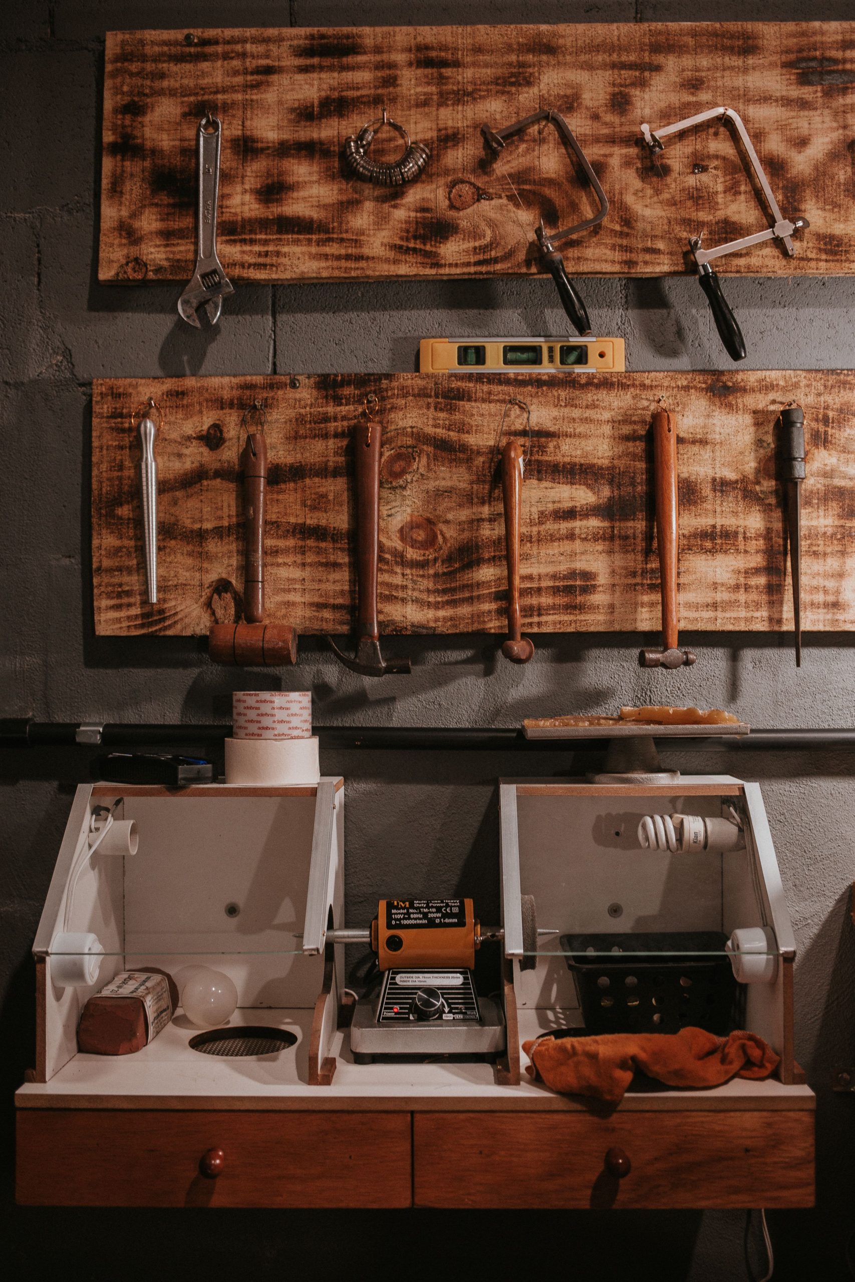 Tools and finishing machines at the Holiday Manor Footwear bench in Louisville